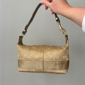 Coach Signature Stripe Top
Handle Pouch Bag - Gold